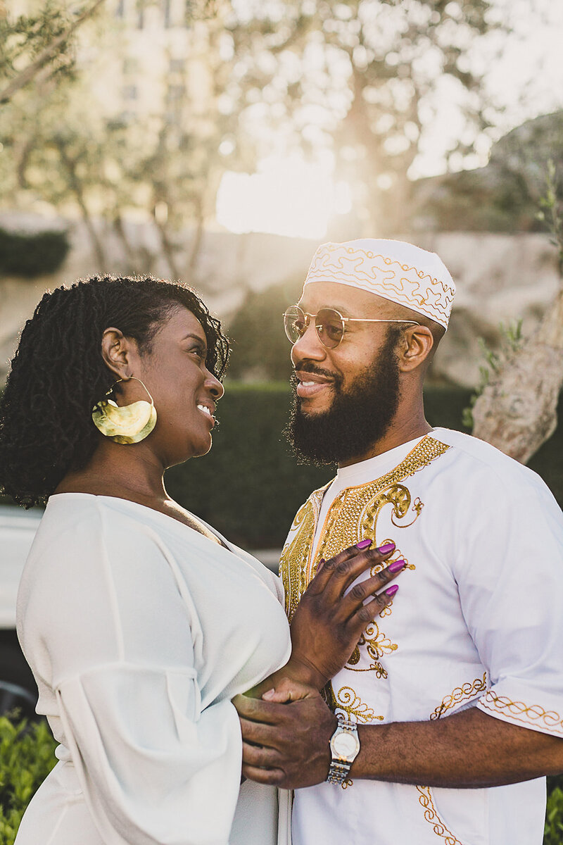 couple embraces in las vegas for engagement photos