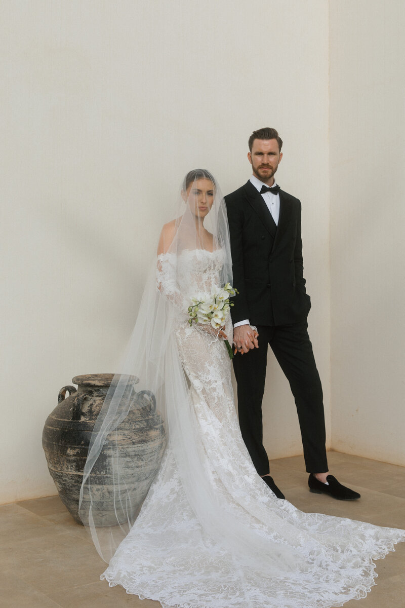 couple holding hands editorial pose