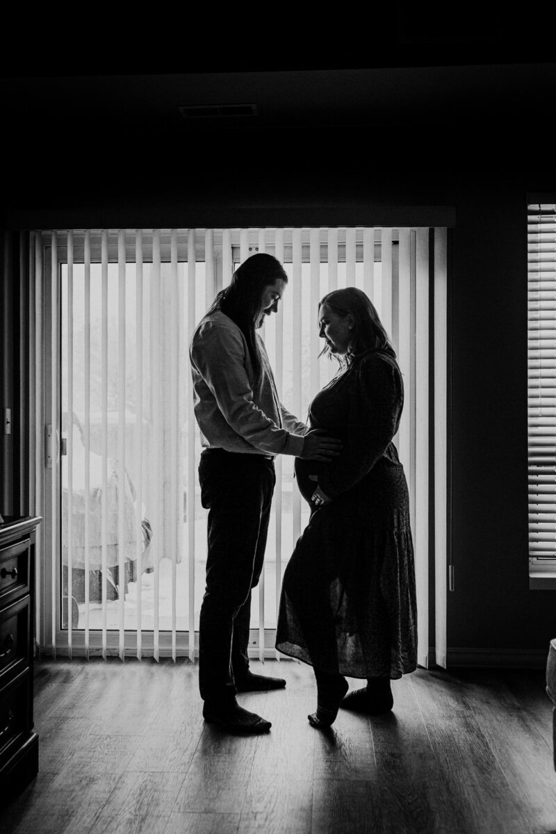 Moody maternity photos at home in Winnipeg 