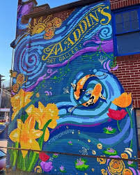 Colorful mural with daffodils, fish and sunshine