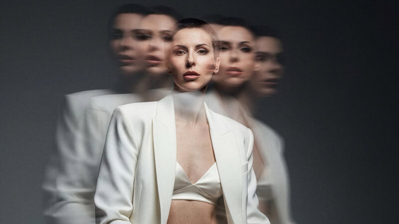 Cinematic portrait of podcast host Jasmina Kimova, founder of a luxury branding platform focused on storytelling and reinvention.