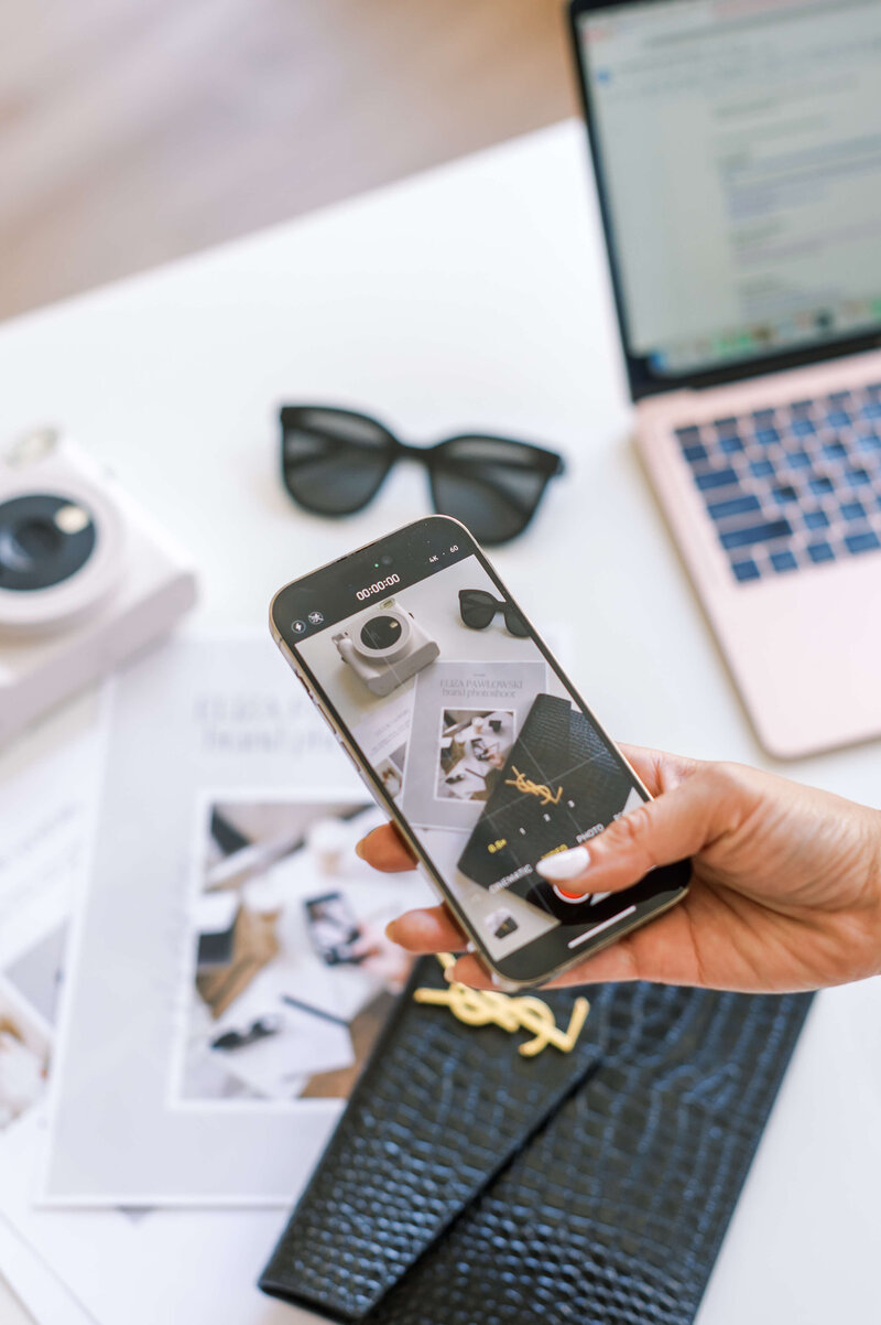 Person Taking Photo on iPhone