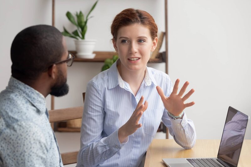 Leader constructively addressing mistakes with team members.