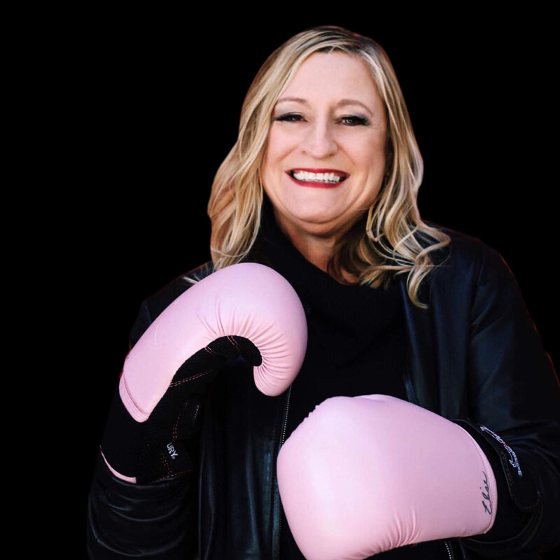 Kamie wearing pink boxing gloves