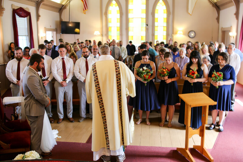 Everyone praying at wedding | Bar Harbor, Maine Wedding Photography