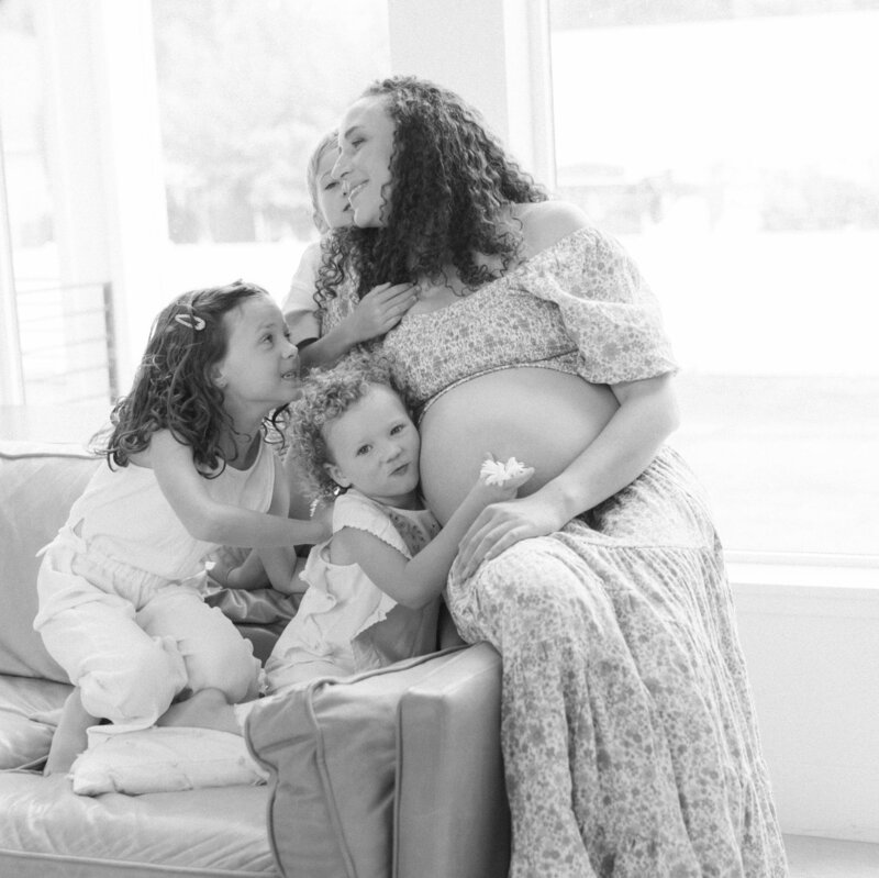 In-home maternity session in Riverton Utah, soft natural light, real moments with toddlers, captured by newborn photographer salt lake city 