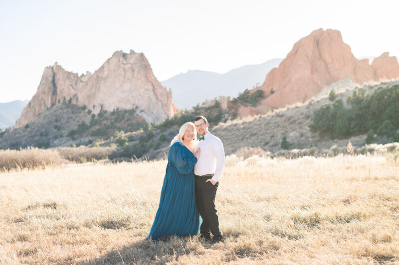 couple eloping in front of mountains