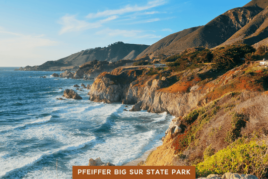 Waves crash against the rocky cliffs of Pfeiffer Big Sur State Park, with golden light on the hills.