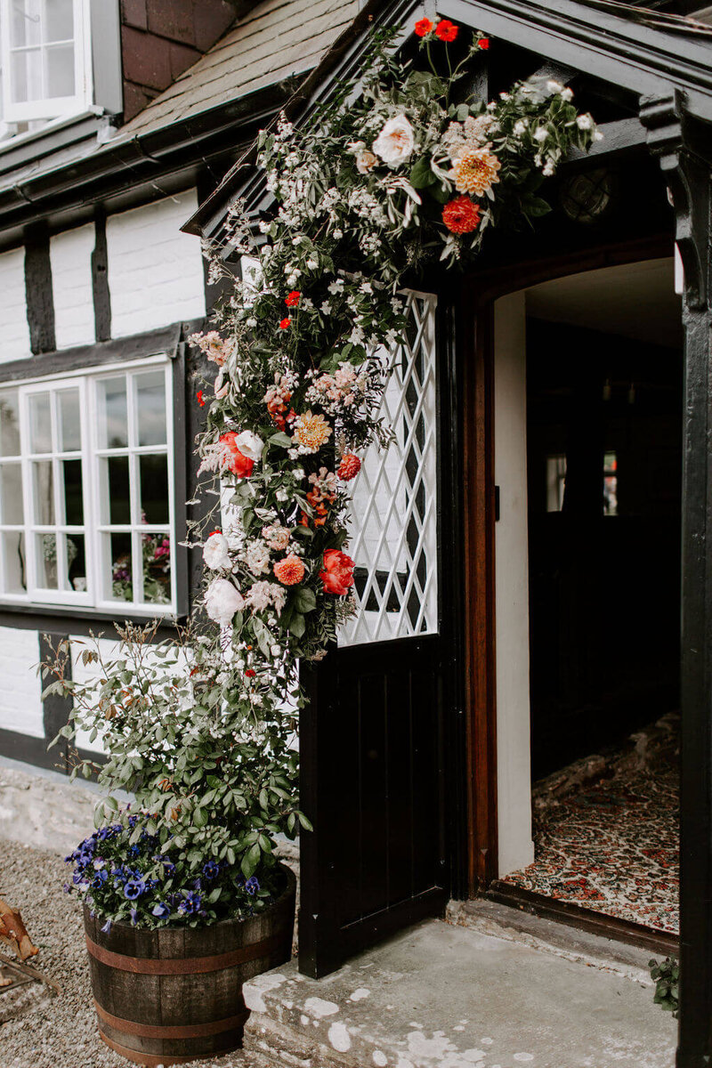 DOOR FLOWERS MARQUEE WEDDING