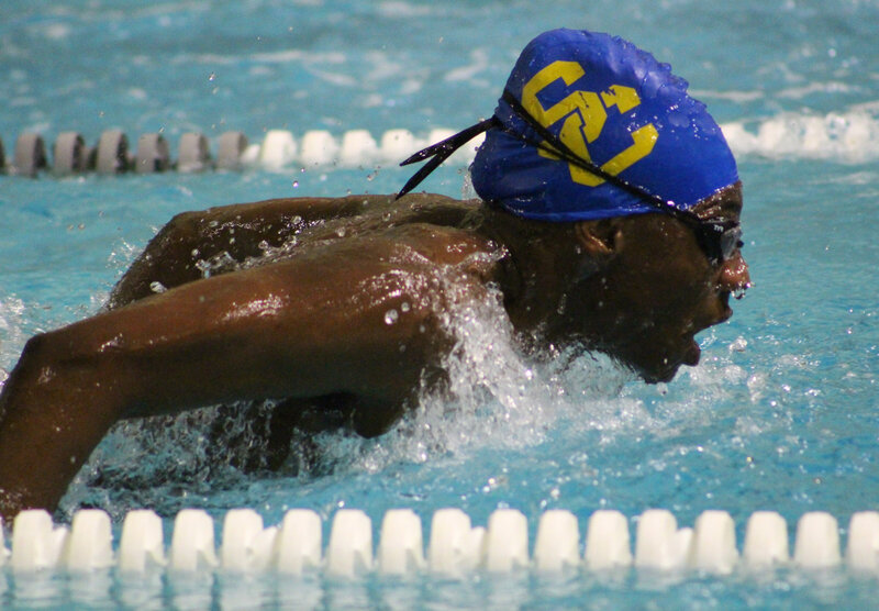 Personal trainers standing on road