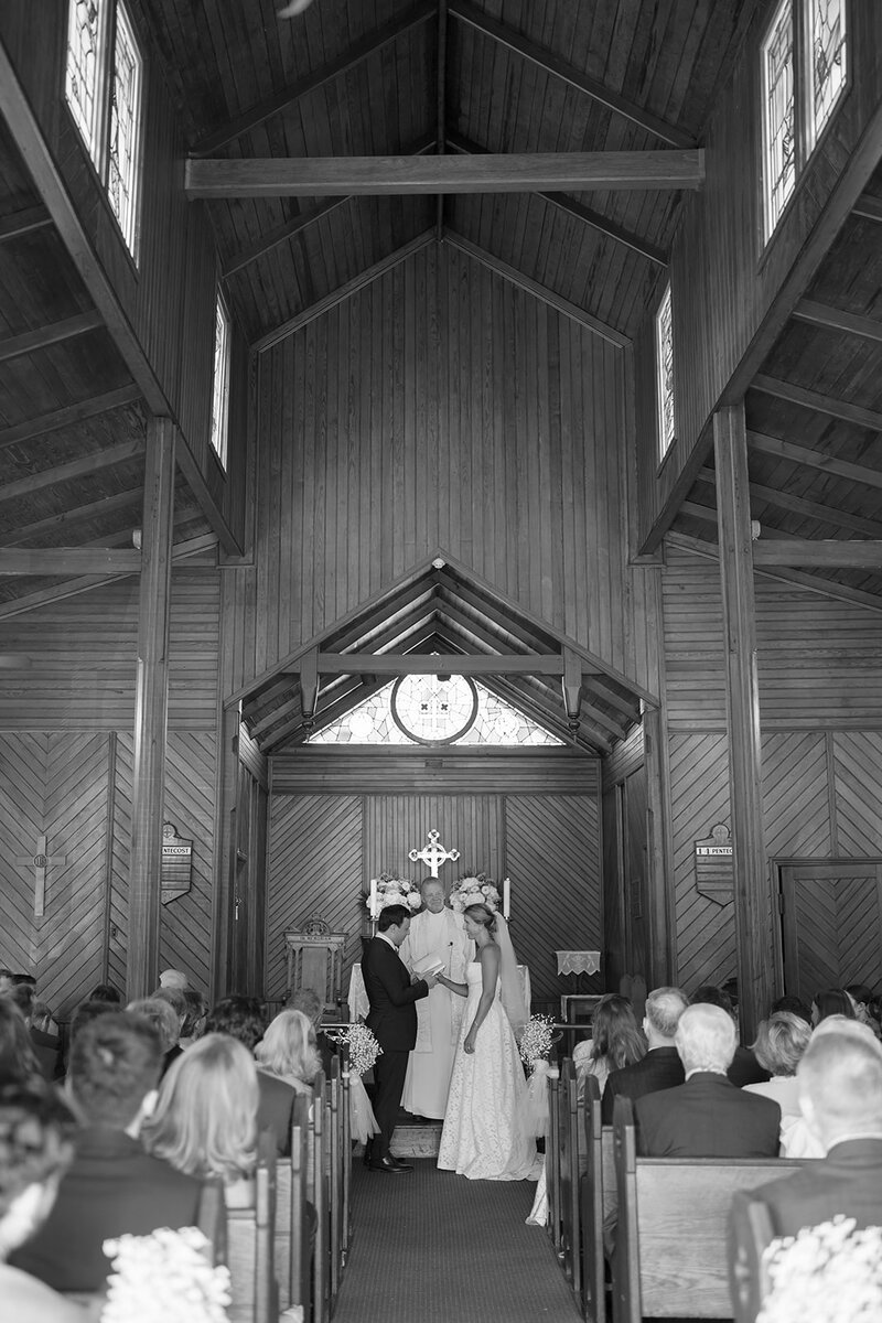 Bride and Groom at the alter during intimate church wedding in Cape May Point, New Jersey