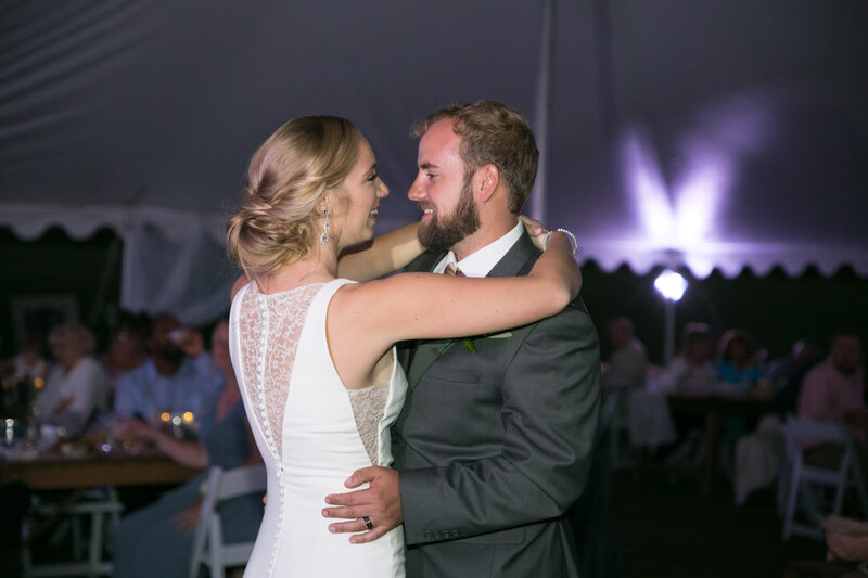 Bride and Groom dancing together at wedding reception | Wedding Photography at Reception