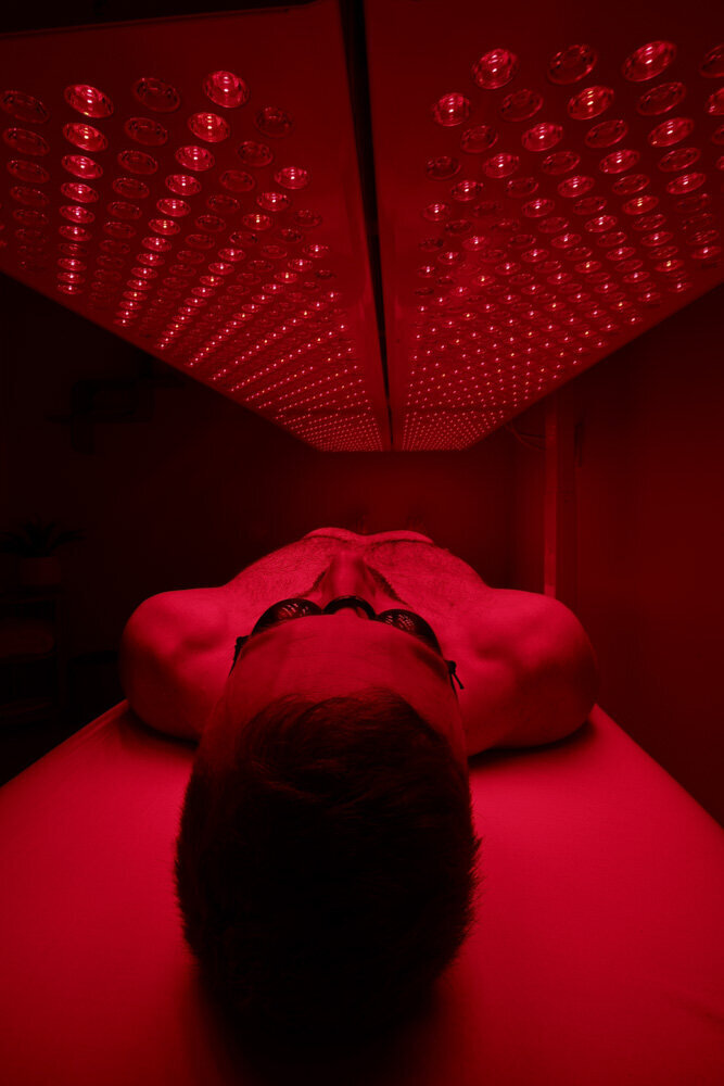 man doing a red light therapy session