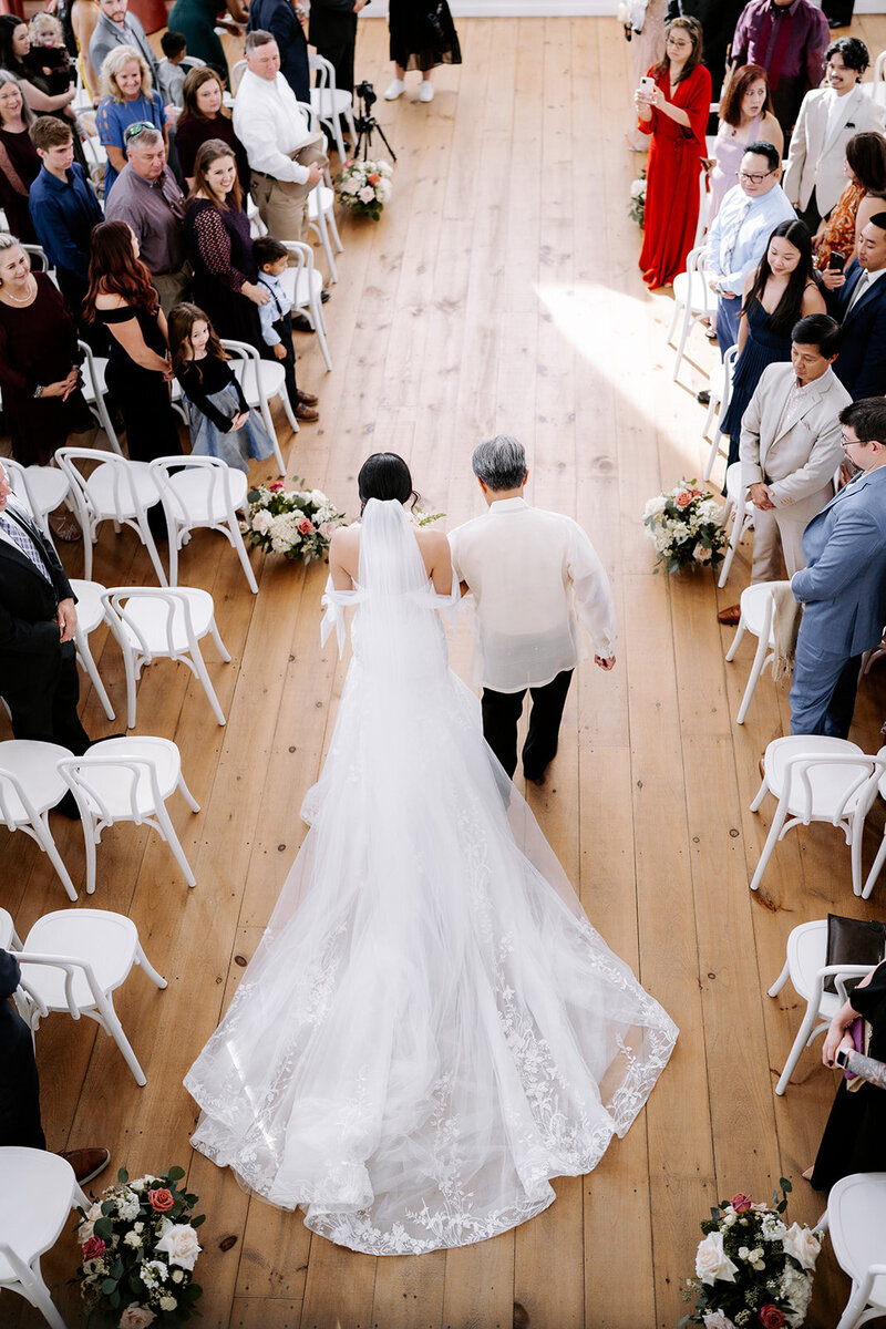 Emotional wedding ceremony moment at a Houston venue by Julie & Daniel Photography