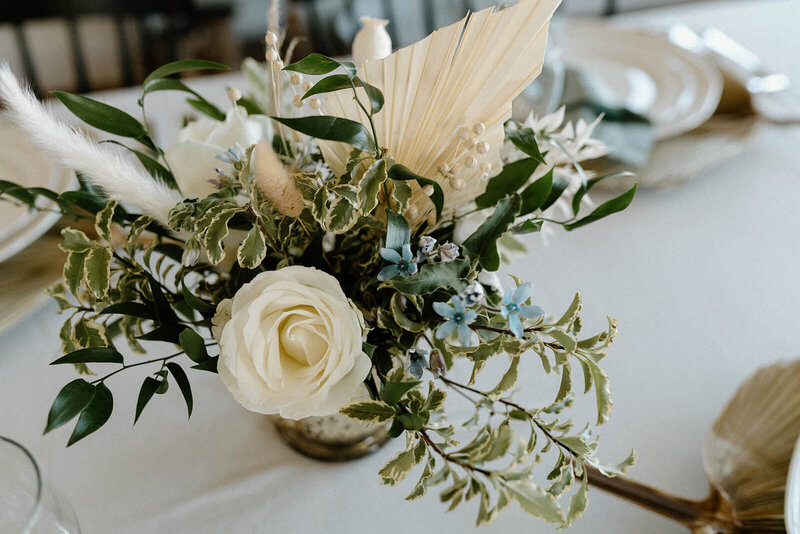 small centerpiece with white flowers