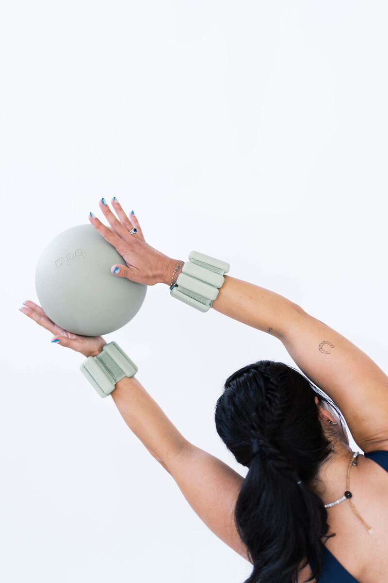 woman side bending in yoga posture pilates birmingham