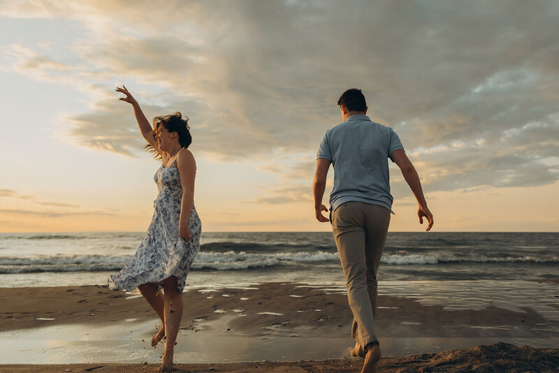 Couple dancing at the beach in Michigan