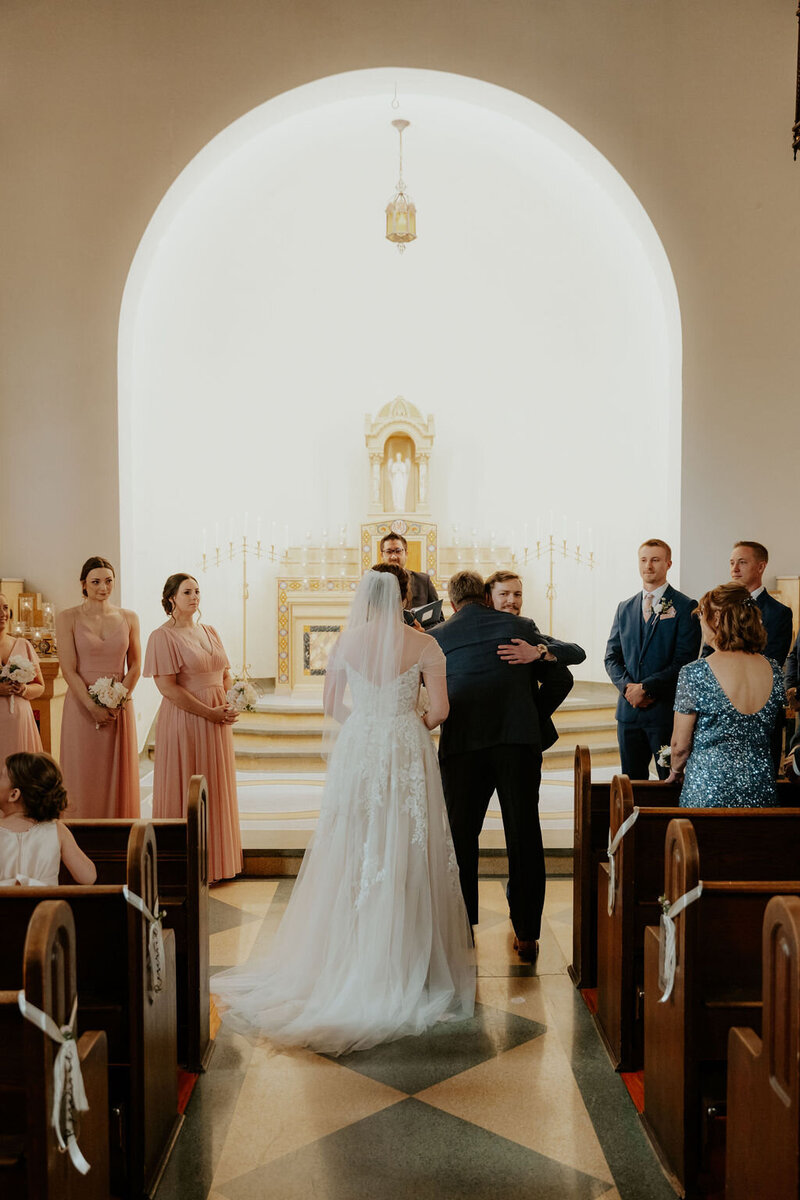 chapel-ceremony-hug