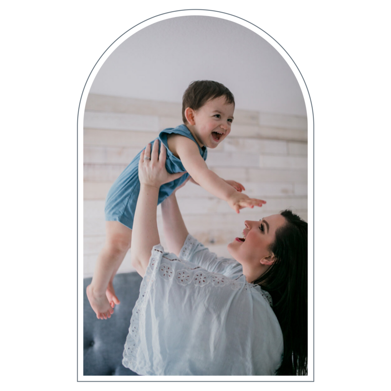 Tender moment between mother and child, dressed in matching outfits, captured by a Portland elopement photographer.
