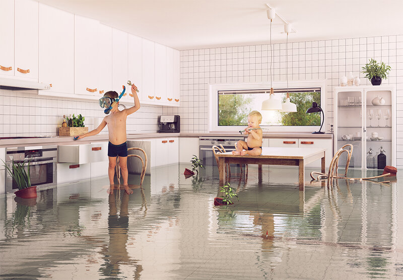kids in flooded kitchen fishing