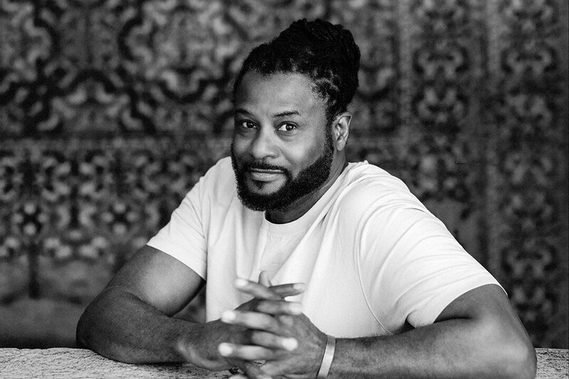 Black & white portrait of Miami wedding photographer Antonio Crutchley, founder of White House Wedding Photography.