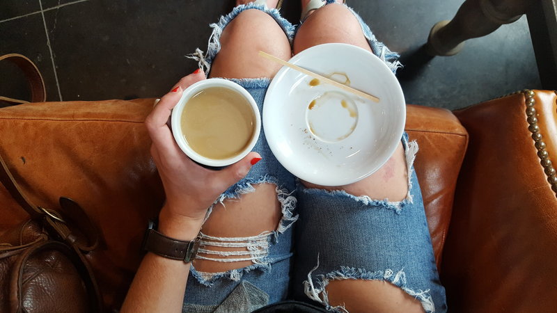 coffee cup in lap