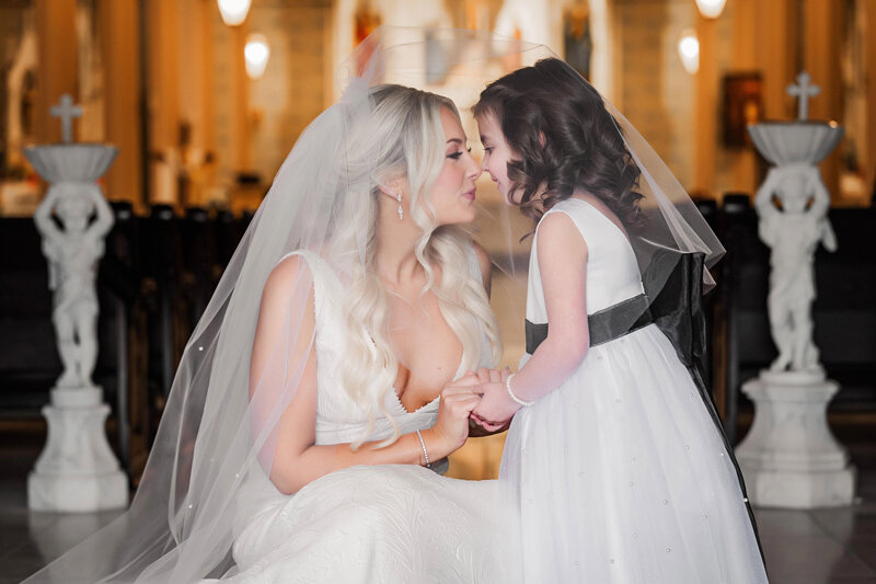 bride and flowergirl at wedding cermeony st peters church pittsburgh north side