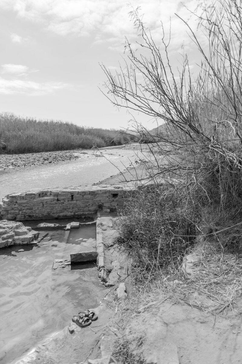 ustic stone ruins and riverbank captured in West Texas by high-end editorial photographer Erin Marcin, ideal for elopement inspiration in natural desert landscapes.

