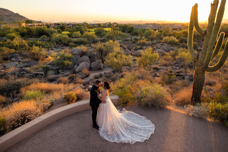 bride and groom kissing