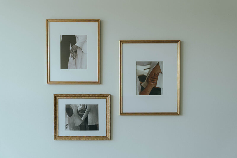 framed prints on the wall during at home engagement photos, captured by Elsie Goodman, an NYC engagement and couples photographer