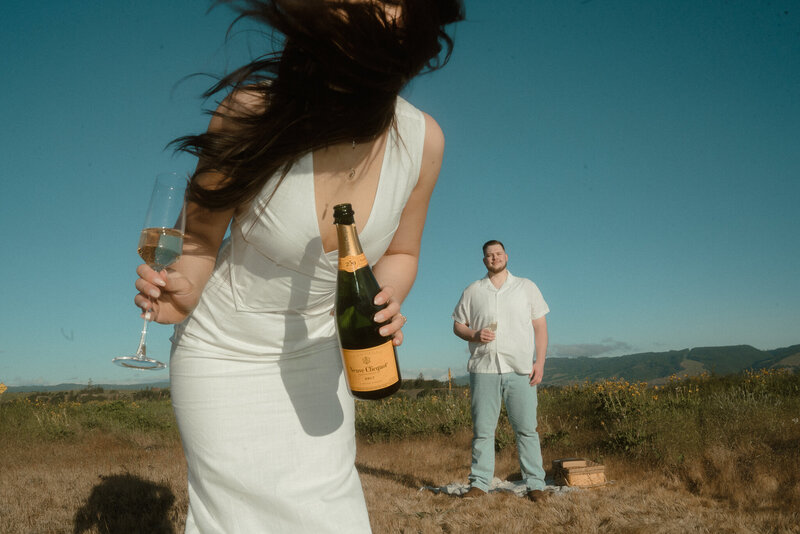 groom with arm around bride at their oregon wedding