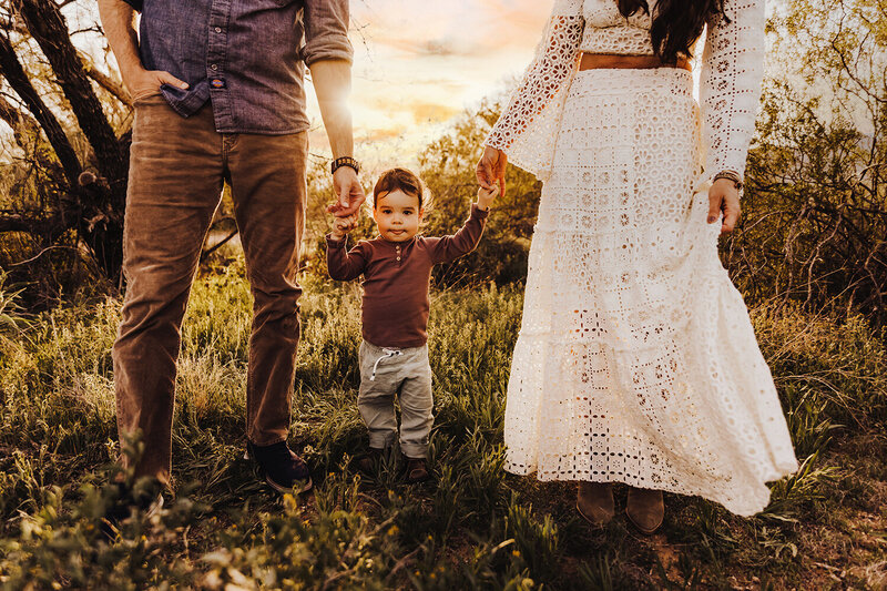 family in field during sunset for phoenix family session