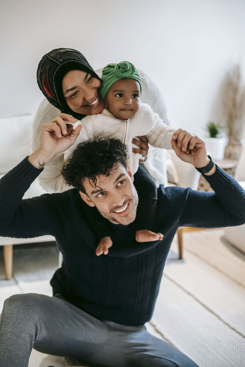 Diverse family playing together