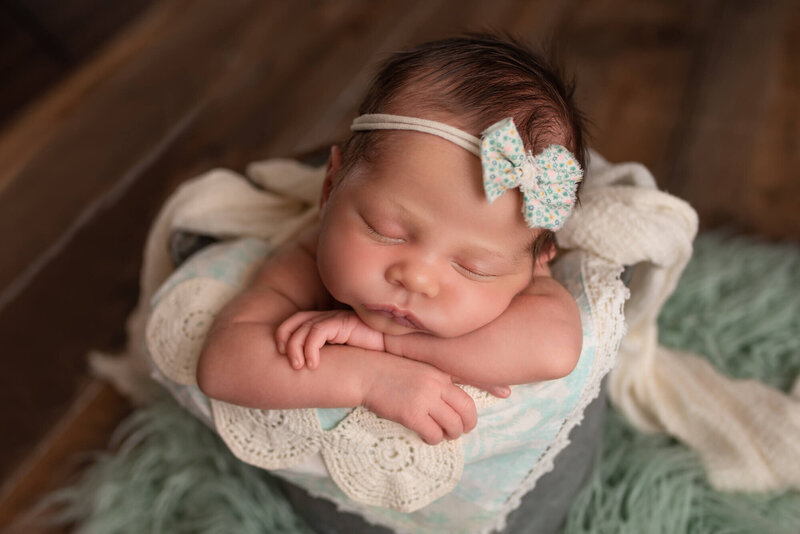 Fond du Lac Wisconsin Newborn Photo baby girl posed in bucket in studio | Glory Be Photography by Tara Bos