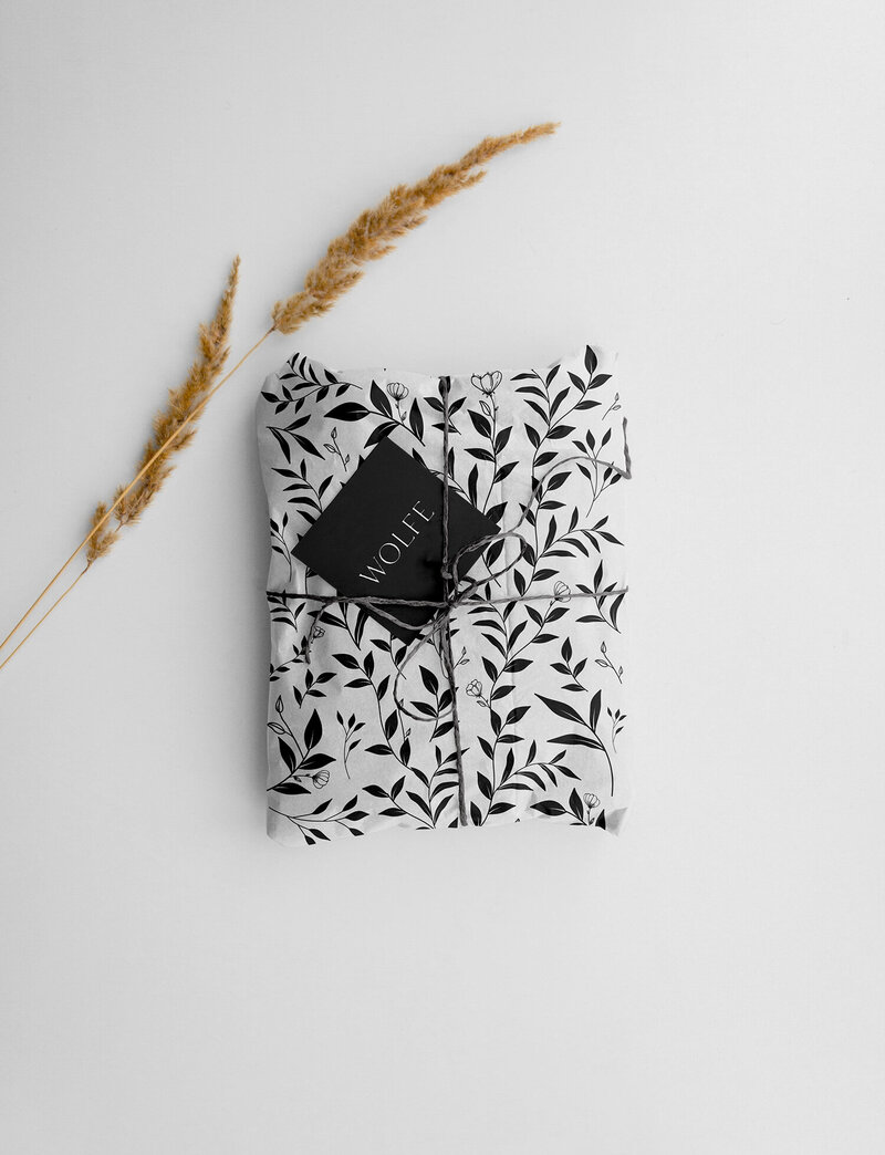 Chic tissue paper design for a sexy fashion boutique, blending minimalism with a provocative design edge.