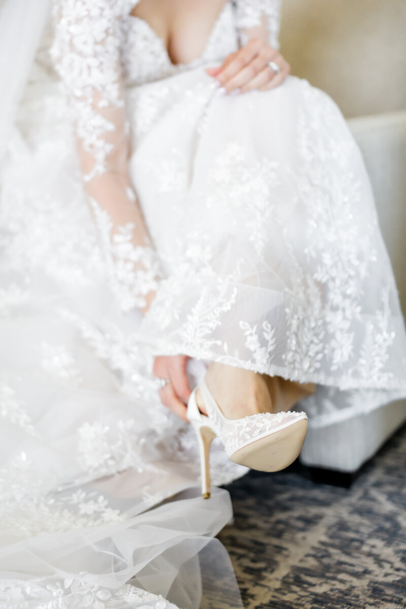 Closeup photo of bride's shoe at a wedding at the four seasons Orlando by Florida wedding photographer.