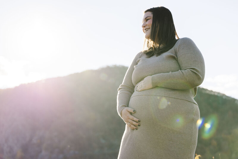 Candid Hudson Valley maternity photographers in Cold Spring capturing playful, real moments