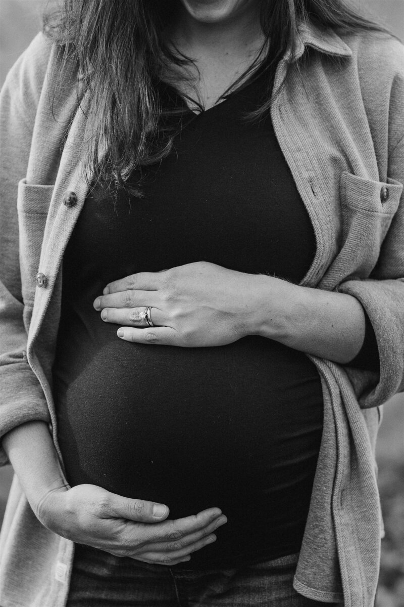 Picture of a pregnant women holding her belly