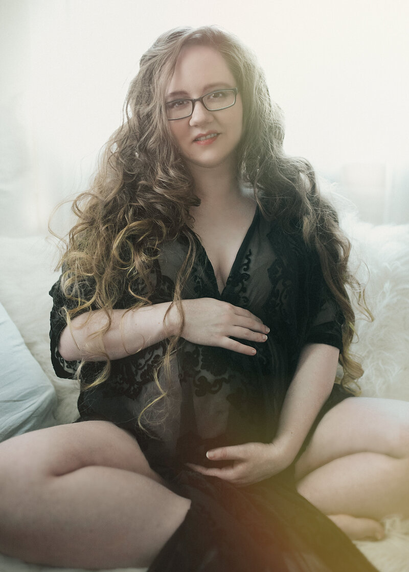 Luxury Photographer, and one of the Midwest's best in boudoir, weddings, portraits and laughter