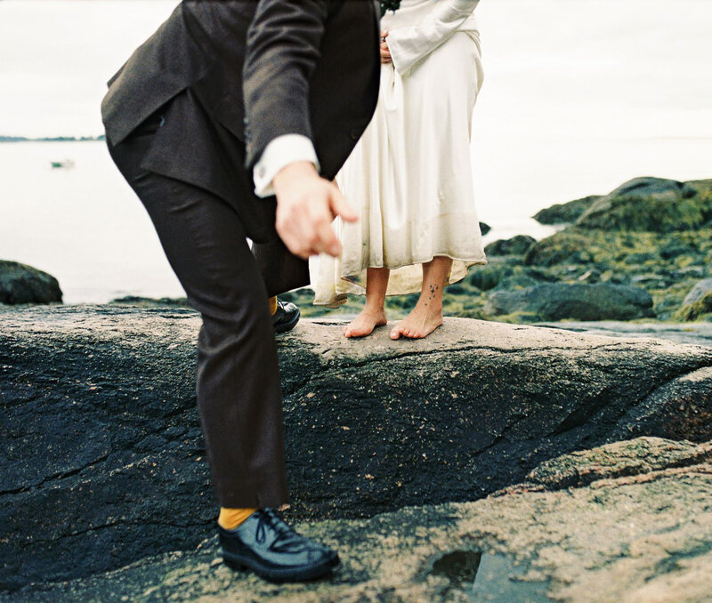 Bride and groom during wedding day portrait session, captured on 35mm film | Editorial-style wedding photography with emotional, artful composition