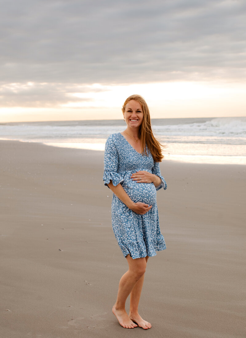 Maternity photo of Liz on the beach