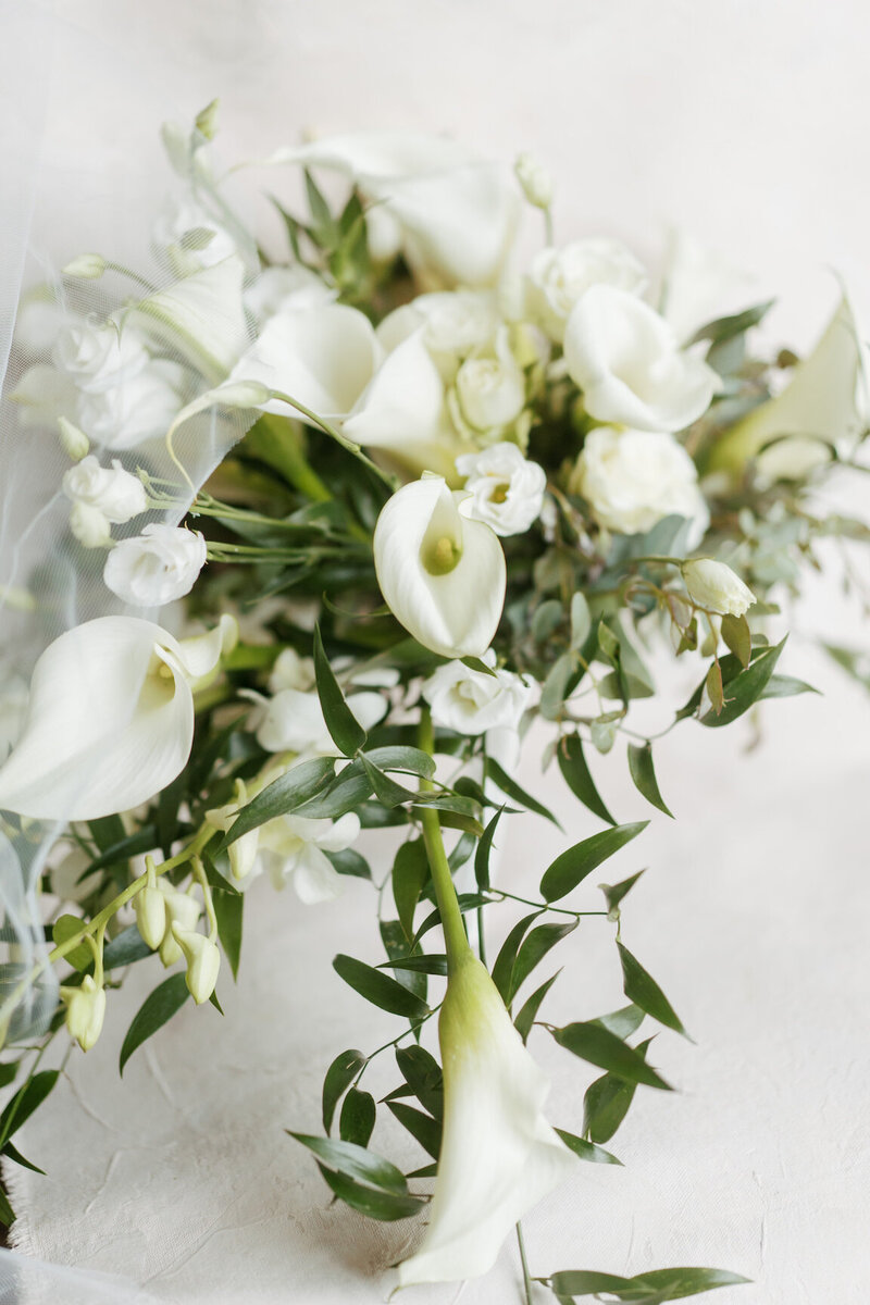 Bride getting ready in Canyonwood Ridge bridal suite with natural light and soft details