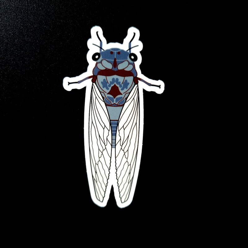 Add a bit of natural charm to your world with this 75mm cicada sticker. Crafted from high-quality vinyl with a weatherproof, scratch-resistant finish, it’s perfect for both indoor and outdoor use. Stick it to your laptop, journal, toolbox, or drink bottle—this durable little bug will hold strong while showing off your love of nature and beautifully detailed design.