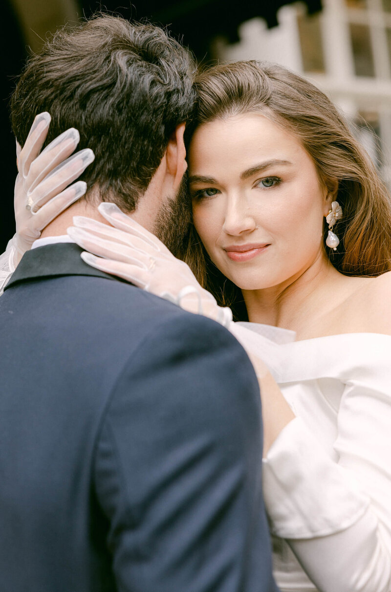 A wedding day photo of the couple in front of the Goring Hotel in London the United Kingdom