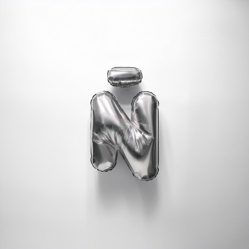 Firefly Letter N made from shiny, crinkled metallic material, with a highly reflective surface that 