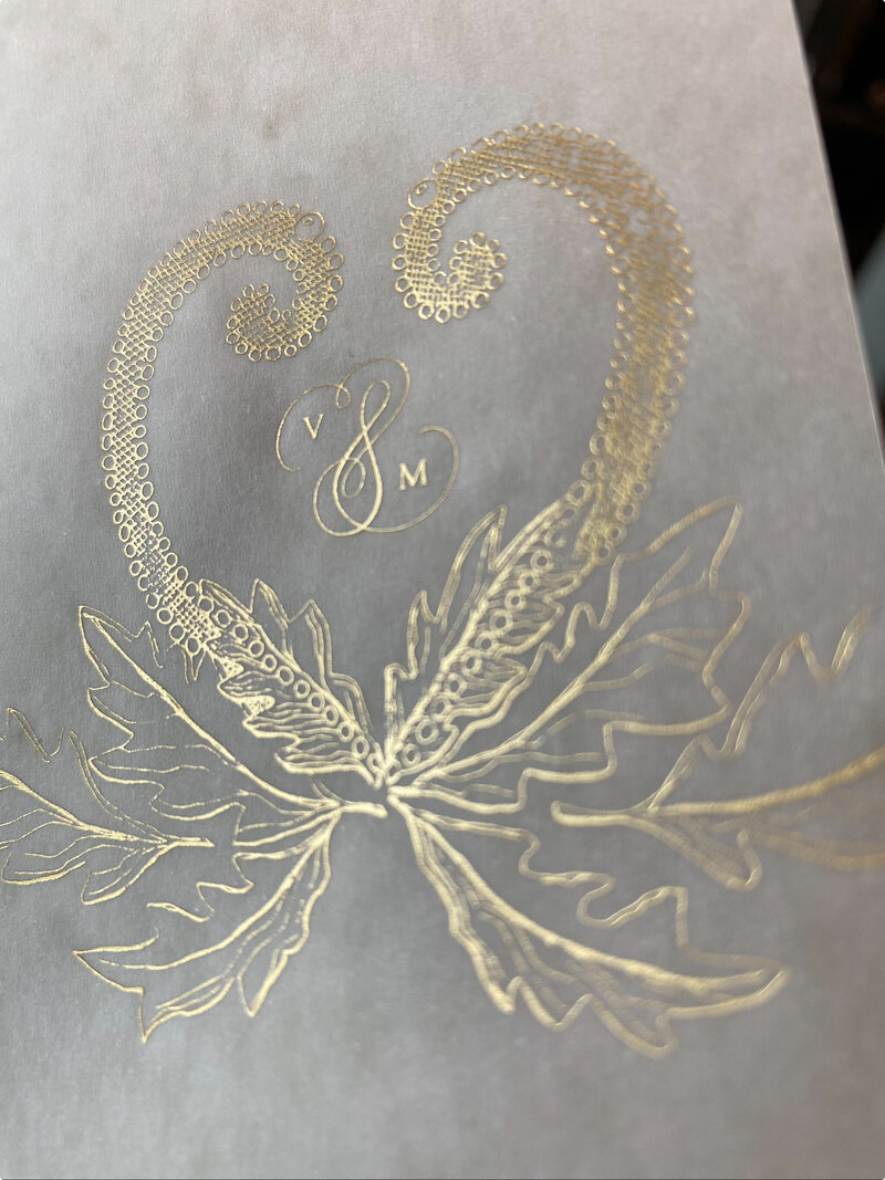 elegant gold custom crest design calligraphy