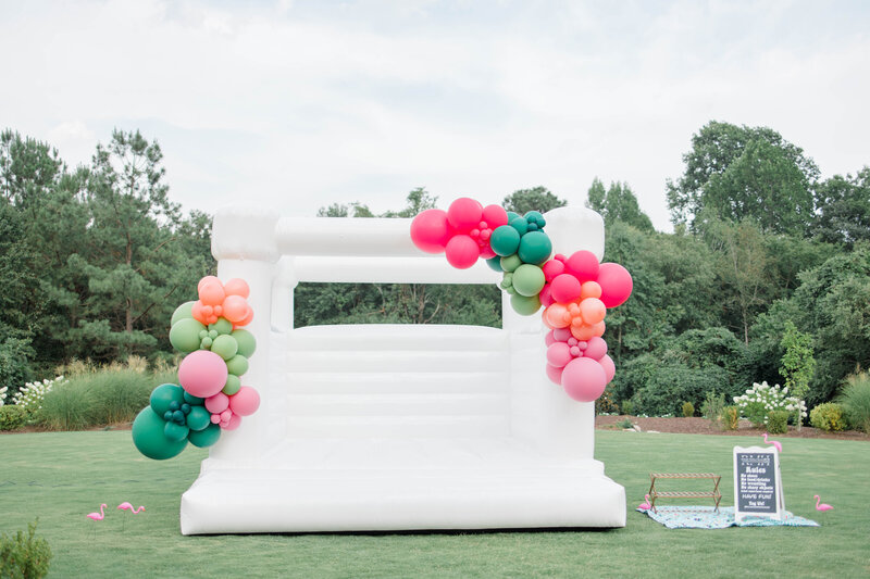 White Modern Bounce House with balloons