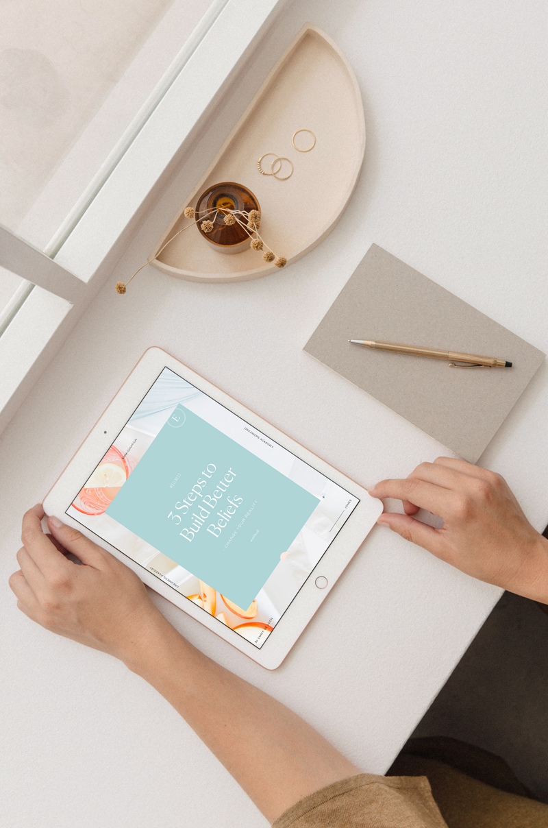 3 Steps to Build Better Beliefs Designers Toolkit display on iPad; feminine hands