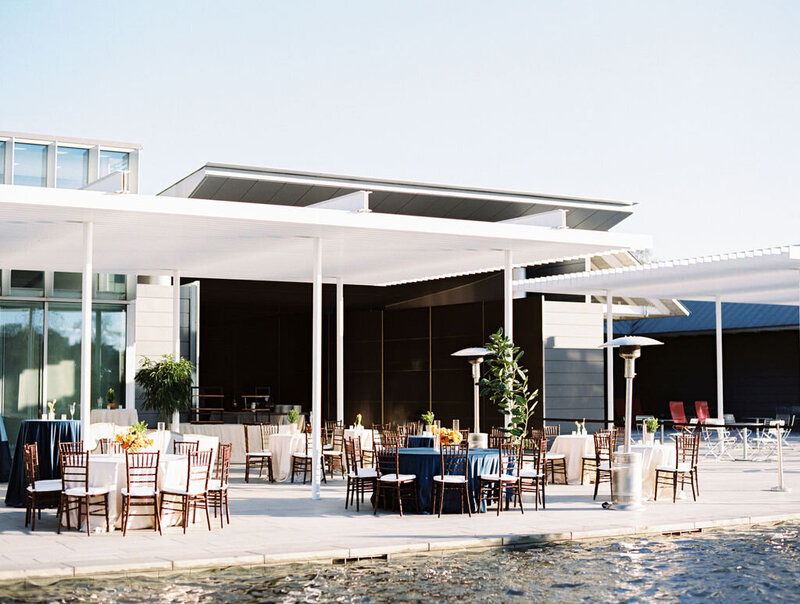 Landscape image of outdoor wedding reception space