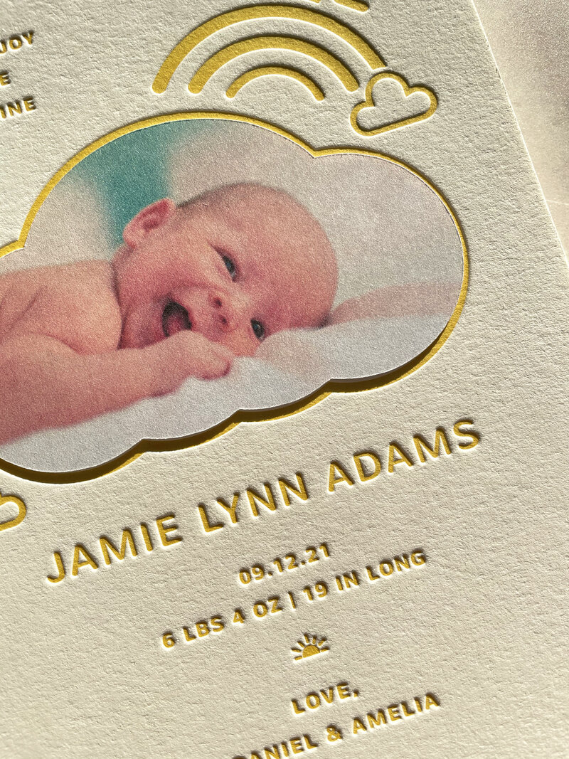 up close photo of letterpress baby announcement